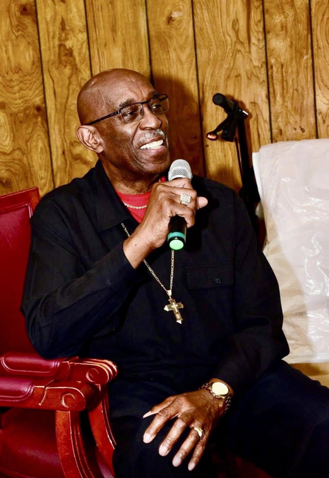 Bishop Smith speaking with a microphone