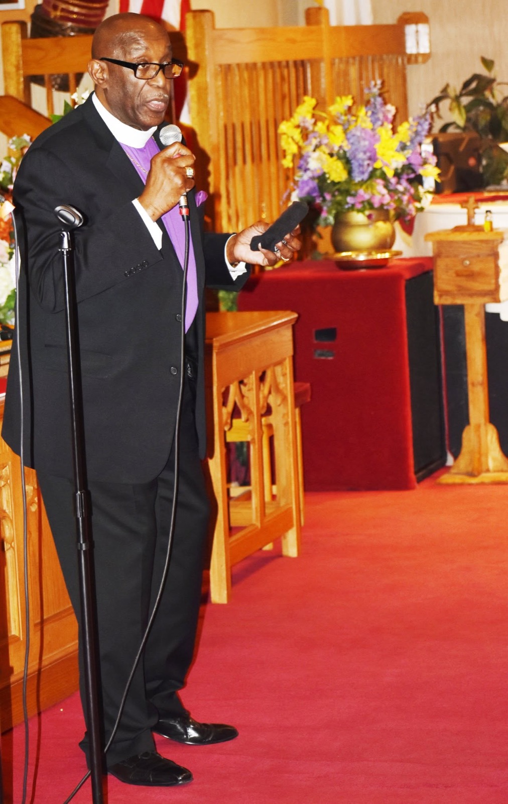 Bishop Leo Smith teaching in church